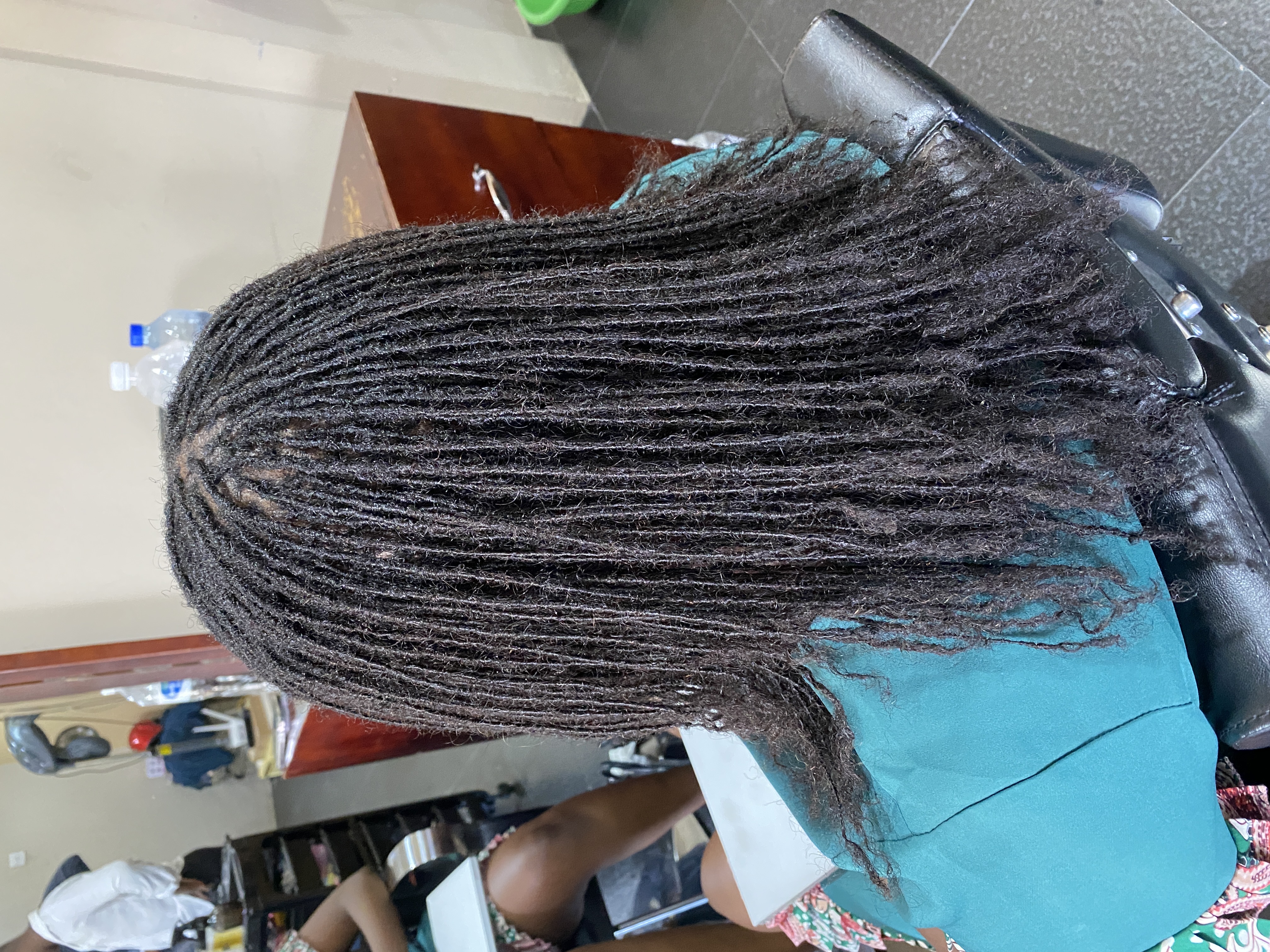 Microlocks Installation on Relaxed Hair: How Microlocks Extensions Make It Possible