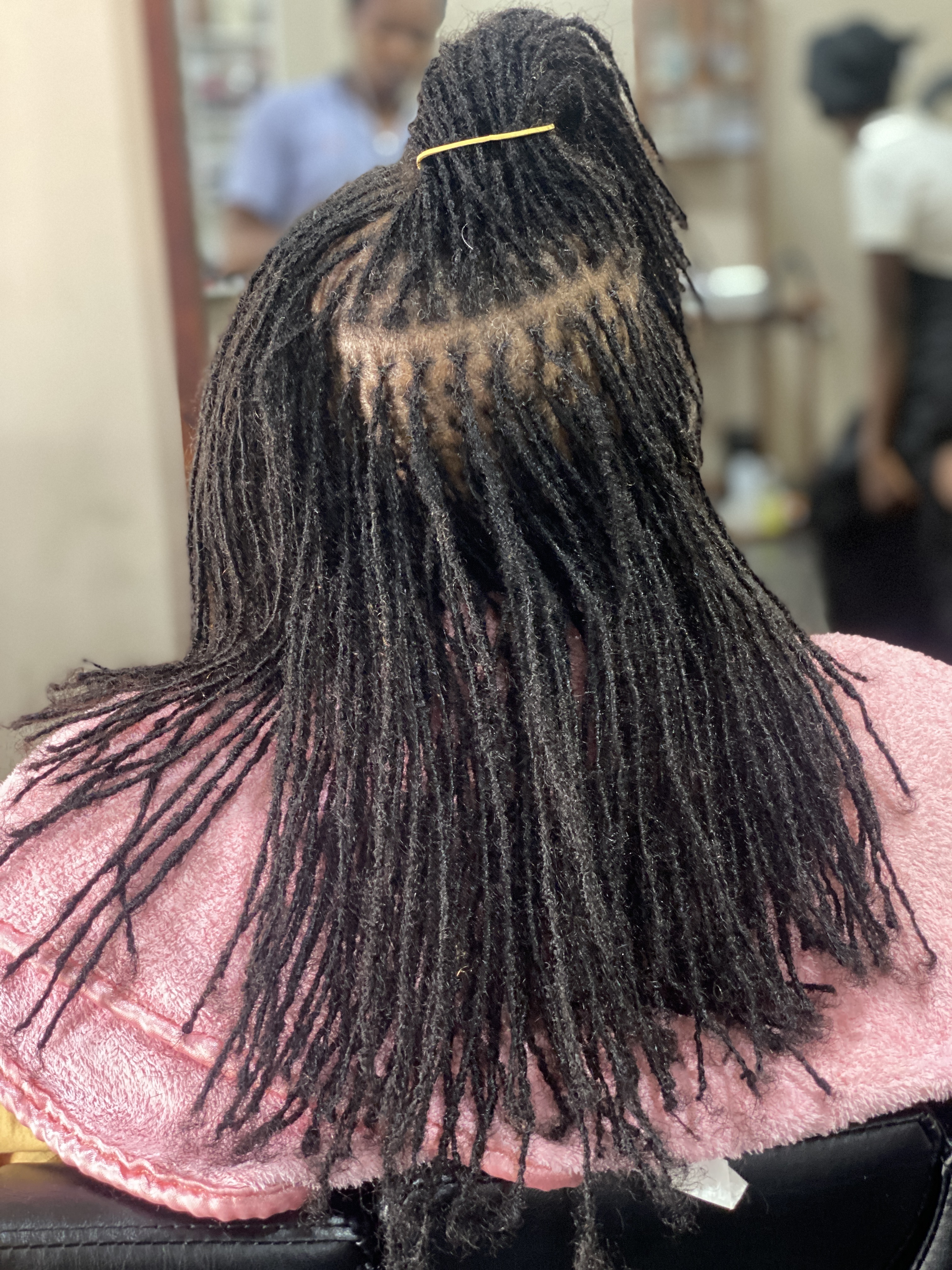 Microlocks Installation on Relaxed Hair: How Microlocks Extensions Make It Possible
