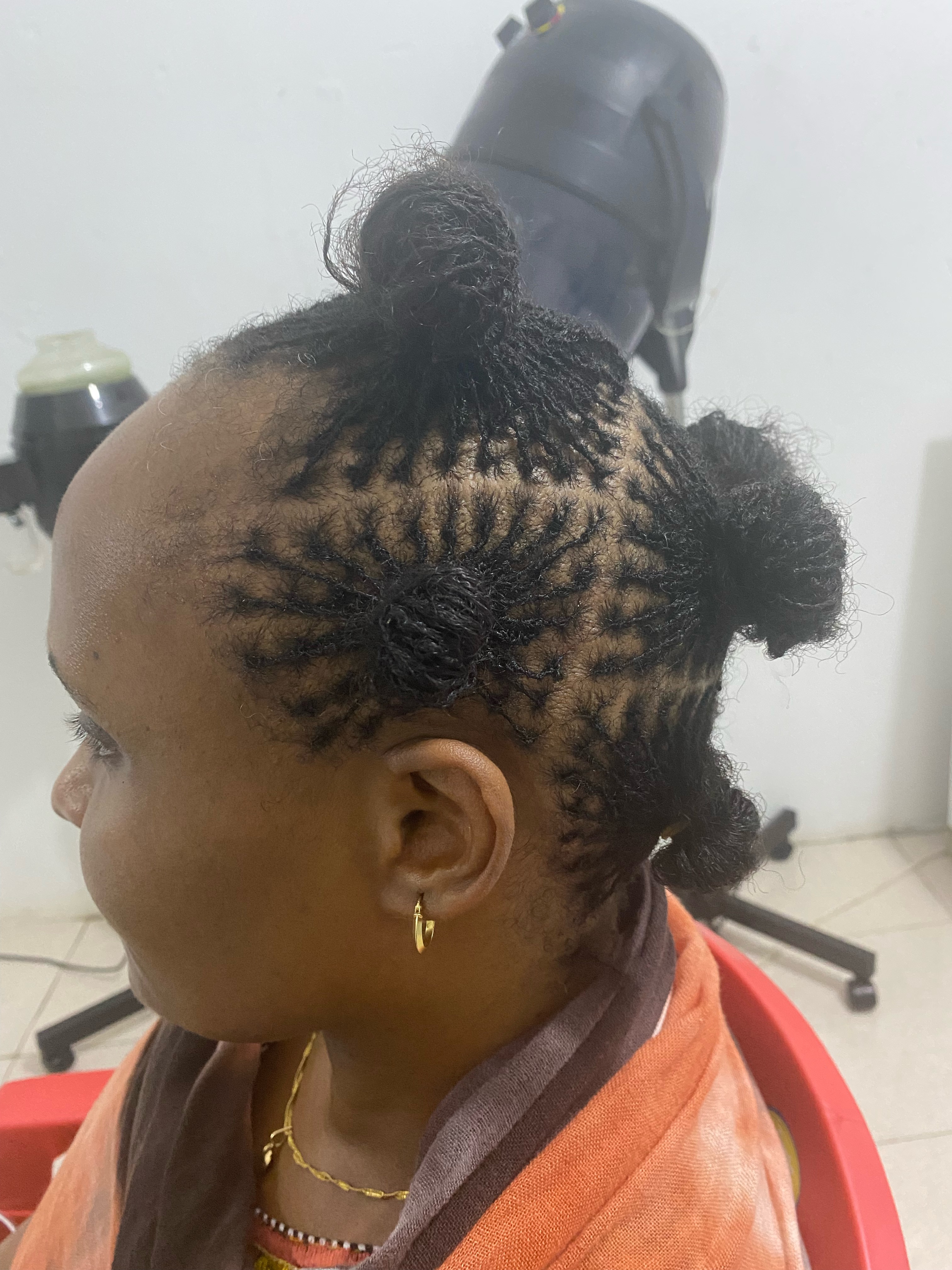 Microlocks Installation on Relaxed Hair: How Microlocks Extensions Make It Possible